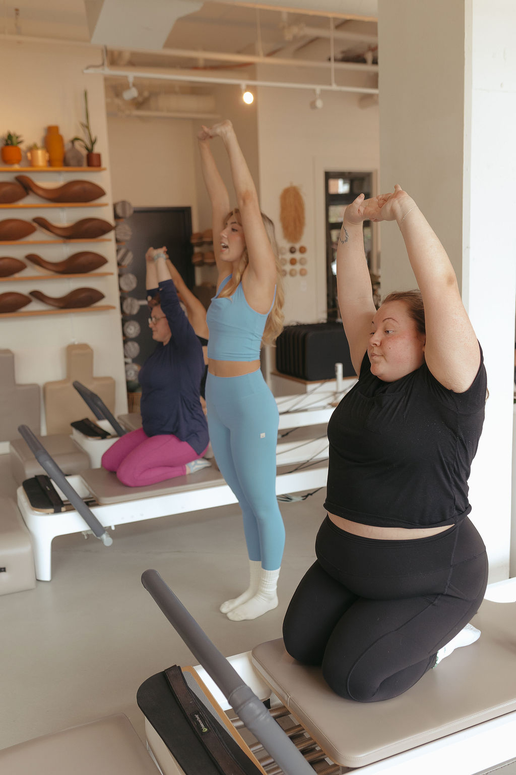 Private Pilates session with instructor and client on reformer